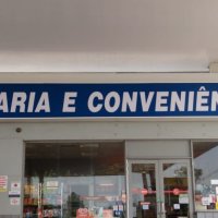 Fachada de lona em loja de Conveni�ncia 